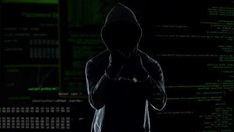 Male programmer standing in handcuffs after committing cyber crime, punishment Video stock 83563034