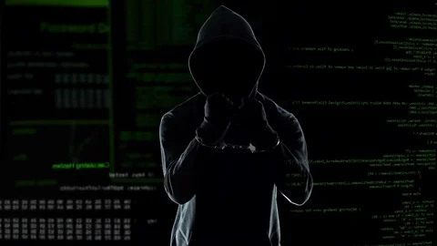 Male programmer standing in handcuffs after committing cyber crime, punishment Stock Footage 83563563