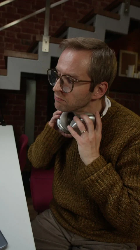 Male Programmer Starting His Working Day in Modern Office Stock Footage 320001991