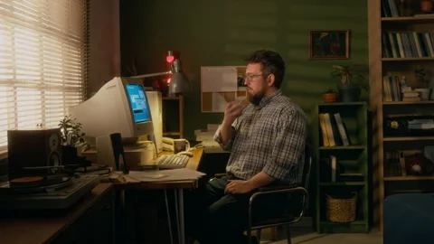 Male Programmer Trying to Establish Internet Connection on Retro Computer Stock-Footage 327236499