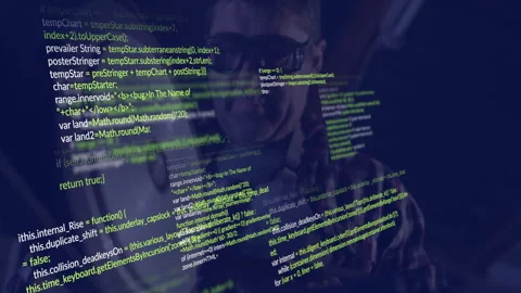 Male programmer typing on keyboard in dimly lit workspace, with floating Stock Footage 307885448