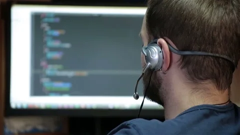 Male programmer working with code on screen Stock Footage 81041436