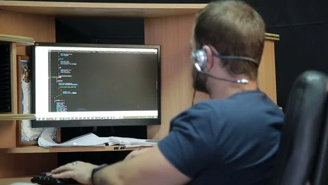 Male programmer working with code on screen Stock Footage 81042451