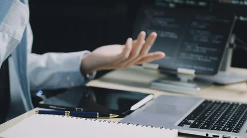 Male programmer working on new project.He working late at night at the office Stock Footage 312244081