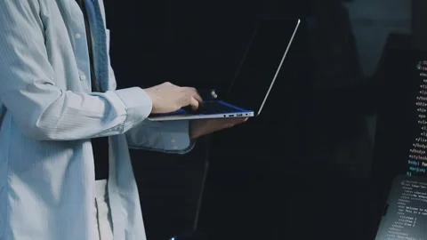 Male programmer working on new project.He working late at night at the office Stock Footage 312244090