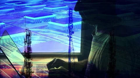 A male programmer works in front of a computer against the background of a 5G Stock Footage 155982157