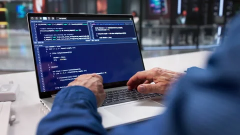 Male Programmer Writing Code Video stock 329685213