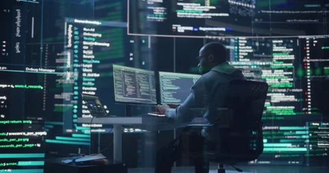 Male Programmer Writing Code Surrounded by Big Screens Stock-Footage 243287664