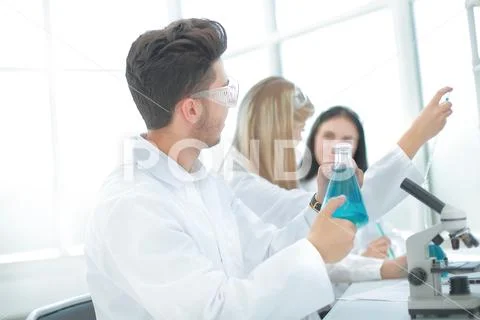 Male researcher carrying out scientific research in a lab Stock Photos