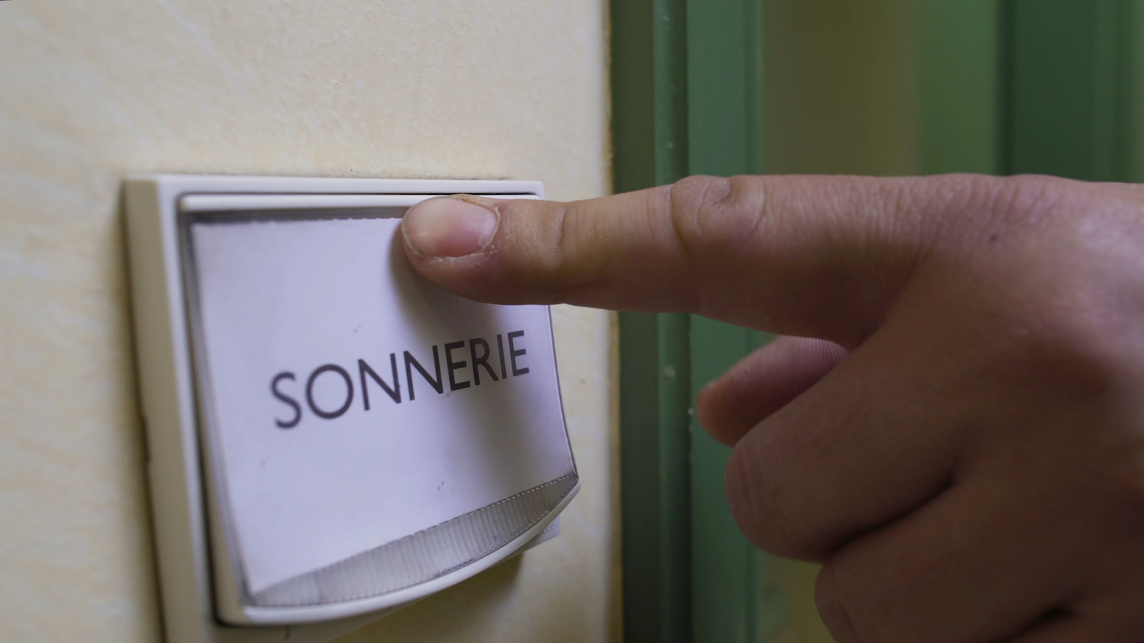 Male Ringing Doorbell Of Apartment Repair Service Worker Came On
