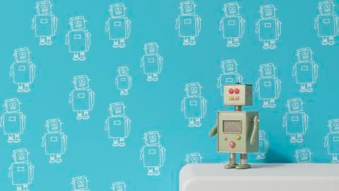 Male robot on sideboard in front of patterned wall paper, 3D rendering 스톡 일러스트