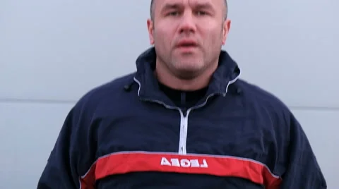  male runner preparing himself, deep breathing, jumping rope Stock Footage 60986293