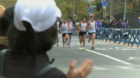 Male runners in marathon Stock Footage