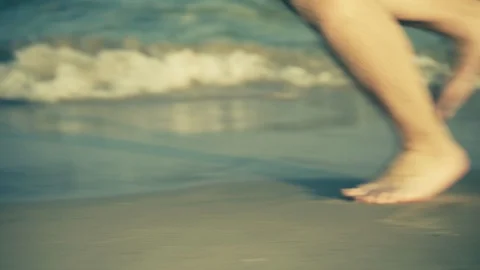 Male Running on the Beach Stock Footage 129281423