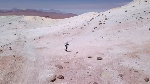 Male running down of a volcano Video stock 87533096