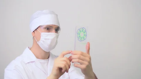 Male scientist using glass tablet digital animation display isolated white 動画素材 103544657