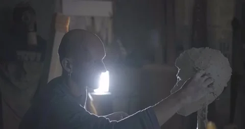 Male sculptor at work Stock Footage 133481376
