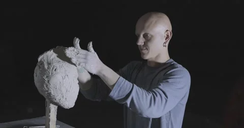 Male sculptor at work Stock Footage 133481659