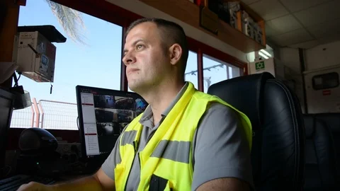 Male security guard on workplace in action Stock Footage 95583492