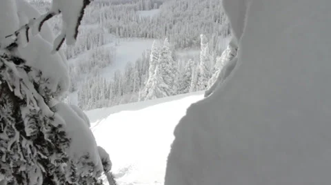 A male skier does a backflip off of a small jump Stock Footage 36295688
