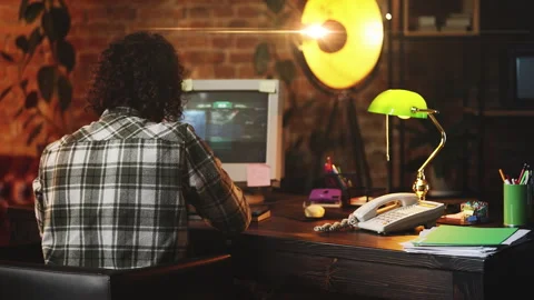 Male software creator successfully running program on retro computer, 90s scene Stock Footage 321084800