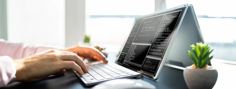 Male Software Developer Typing Code Stock Photos