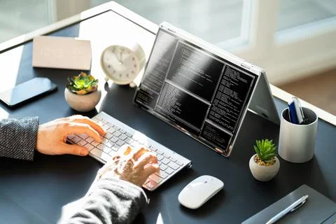 Male Software Developer Typing Code Stock Photos