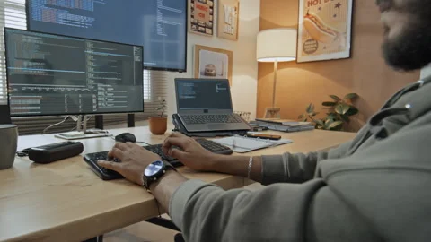 Male Software Developer Working on Computer from Home Stock Footage 255929188