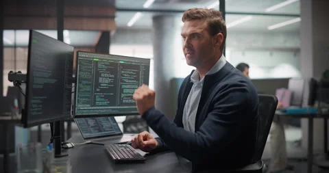 Male Software Developer Working in Office Stock Footage 321012192