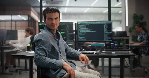 Male Software Developer Working in Office Stock Footage 321012328