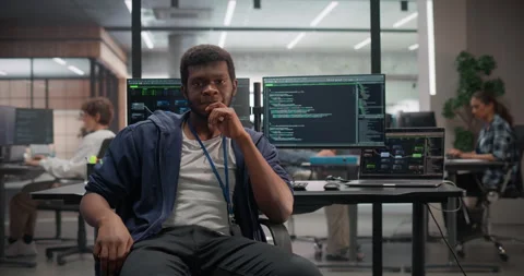 Male Software Developer Working in Office Stock Footage 321012373