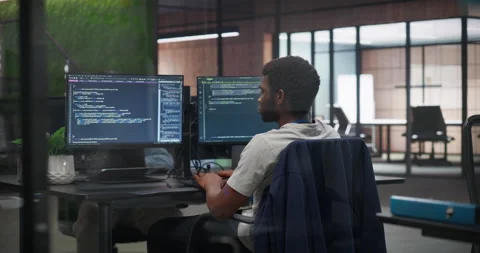 Male Software Developer Working in Office Stock Footage 321014690