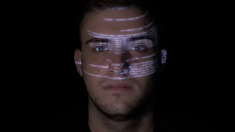 Male software programmer coding on a virtual reality screen with running code Stock Footage 86435014