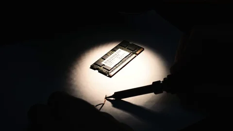 Male solder computer chip Stock Footage 95998191