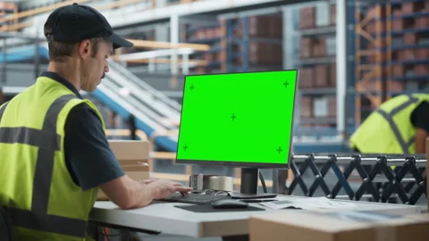 Male Sorting Center Worker Using Chromakey Computer Video stock 251735824