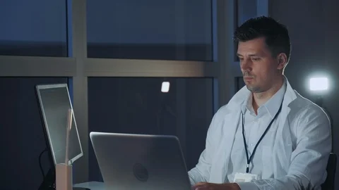 Male specialist in electronics working on the computer in modern lab Stock Footage 112868240