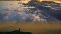 The male standing on a mountain with a cloud stream background. time lapse 4k or 4k+ Resolution
