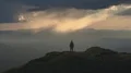 The male standing on the mountain with a picturesque landscape 4k or 4k+ Resolution