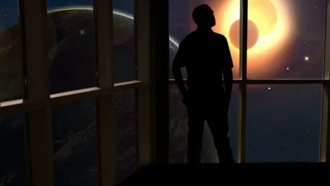 A male stands looking over an outer space scene in this futuristic concept. Stock Footage 112878186