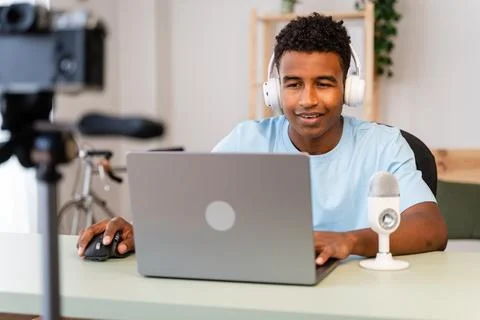 Male streamer recording tutorial from home. Stock Photos