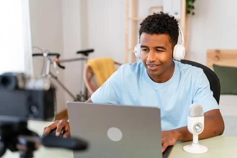 Male streamer recording tutorial from home. Stock Photos