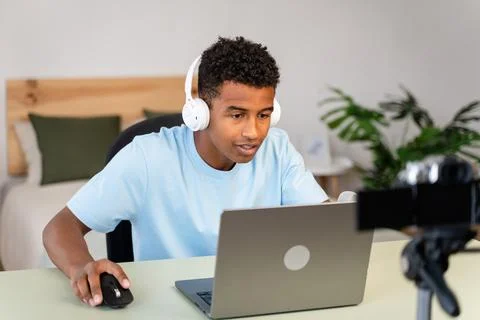 Male streamer recording tutorial from home. Stock Photos