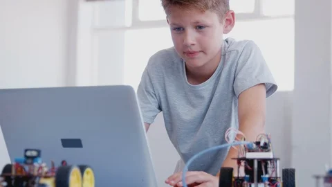 Male Student Building And Programing Robot Vehicle In After School Computer 動画素材 111933563