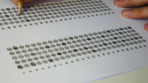 Male student hand testing doing examination test with standardized test Stock Footage 121563936