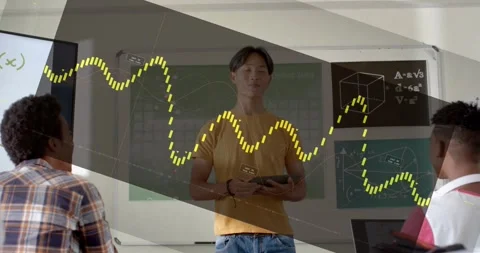 Male student tapping tablet and presenting math lesson camera rising yellow Stock Footage 334308277