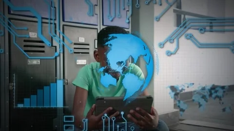Male student tapping tablet by lockers, summoning blue globe overlay over screen Stockbeeldmateriaal 333999537