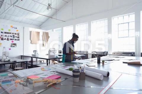 Male student working on a project at a fashion college Stock Photos