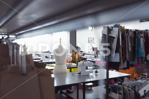 Male student working on a project at a fashion college Stock Photos