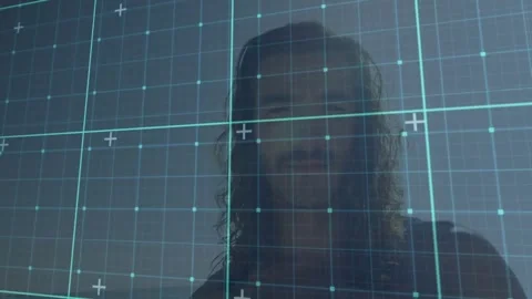 Male subject experiencing biometric technology mapping as cyan grid sweeping and Stock Footage 328005642