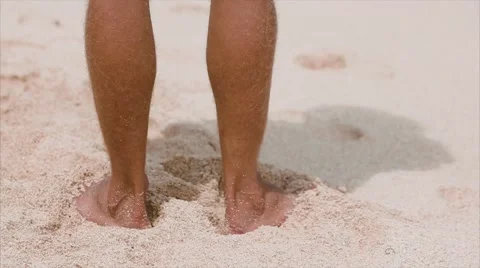 Male surfer on the beach, the wind develops your hair. Stock Footage 66578716
